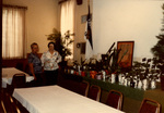 Women Standing By Plants At The Spaghetti Dinner Event , November 1979