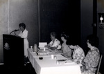 Woman Standing At Podium