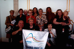 People Holding a Altrusa Club of Tampa Bay Banner.