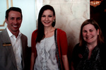 Man And Two Women Pose For a Photo