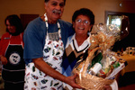 A Man And a Woman Holding a Gift Basket