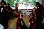 Group of People Showcasing Poster Board