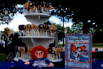 A Raggedy Ann And a Raggedy Ann Book On a Desert Table