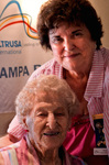 Two Women Pose For a Photograph