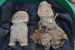 Close-up of two Figurine Offerings Side-by-Side
