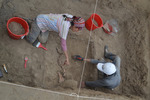 Excavating Rasgo 6 Camelid