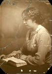 Blanche Armwood sitting with a book