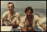 Frank Dutcher and Dennis Sisco smile aboard a boat on Terra Ceia Bay by Unknown