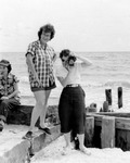 Three women at a beach near Tampa by Bobby Smith and Rex Maniscalco