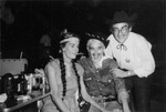 Three People Dressed in Western Costumes at Jimmie White's Tavern