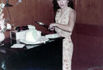 Woman cutting cake