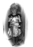 Drag queen in costume and blonde wig