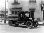 Coca-cola delivery truck with driver and passenger by Burgert Brothers