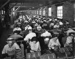 Cigar Makers Working with Cigar Presses at the A. Santaella and Company Factory
