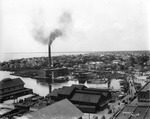 Aerial view of the Tampa Electric Plant and the surrounding neighborhood, including the Lafayette Street Bridge by Burgert Brothers