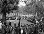 Crowd of spectators around a game of horeshoes in Plant Park by Burgert Brothers