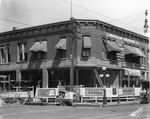 Drowdy's Corner Being Refurbished for Future Occupancy by D.P. Davis Properties at 502 South Franklin Street, August 6, 1924 by Burgert Brothers