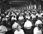 Lector Reading to Cigar Makers at the Corral Wodiska Factory, August 27, 1929 by Burgert Brothers