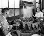 Men Sorting Tobacco at a Cigar Factory