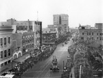 Horse-drawn floats on Franklin Street during a Gasparilla parade by Burgert Brothers