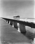 Miami-bound Greyhound bus crossing the Overseas Highway by Burgert Brothers