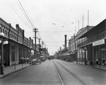 Street scene on 7th Avenue in Ybor City by Burgert Brothers
