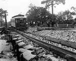 Onlookers view damage to trolley tracks and roadway on Bayshore Boulevard in Tampa, Florida from the hurricane of 1921 by Burgert Brothers
