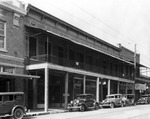 Storefronts on 7th Avenue in Ybor City by Burgert Brothers