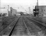 Railroad Tracks Intersecting 6th Avenue and Passing by the Imperial Cafe in Ybor City, September 6, 1935 by Burgert Brothers