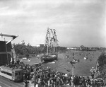 Ship Jose Gaspar sailing by the Lafayette Street Bridge and the Tampa Bay Hotel during a Gasparilla Festival by Burgert Brothers