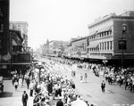 Parade on Franklin Avenue in front of the Maas Brothers Store by Burgert Brothers