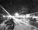 Seventh Avenue at Night by Burgert Brothers