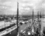 Sailing ships at the Mallory Line Docks by Burgert Brothers