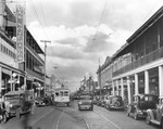 Trolley Car on 7th Avenue in Ybor City Passing Las Novedades Cafe, the Ritz Theater, and the Ybor City Chamber of Commerce