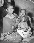 Seminole Indian mother holding child in Musa Isle by Burgert Brothers