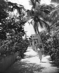 Woman in Front of a House in Key West