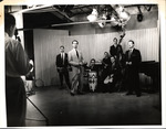 Cesar Gonzmart and his band play for television