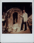 Cesar Gonzmart beside a pottery kiln in Guadalajara, Mexico