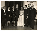Adela Gonzmart (in white dress), possible after a piano recital; Cesar Gonzmart stands second from right