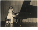 Adela Gonzmart at a piano recital