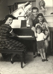 Adela Gonzmart with Cesar, Casey and Richard at the Piano by Unknown