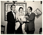 Cesar Gonzmart with Bob Hope and a Young Lady by Unknown