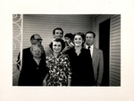 Cesar and Adela Gonzmart with Baby Casey in the Center, Casimiro Jr. and Carmen Hernandez at Left, Marcelino and Aurora Martinez at Right by Unknown