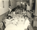 Adela and Cesar Gonzmart Host a Group of Children, Including Their Sons by Unknown
