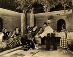Dancers at the Columbia Restaurant, with Adela Hernandez (later Gonzmart) appearing between the dancers' faces