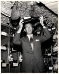 Columbia Restaurant Employee Pete Peemer in the Wine Cellar by Unknown