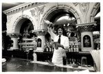 Michael Roby pours a drink at the Columbia Restaurant