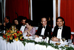 Gonzmart family at a celebration; from left: unidentified priest, Melanie, Richard, Adela, Cesar, and Casey Gonzmart