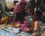 Woman and child in a refugee camp