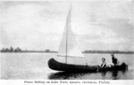 Canoe sailing on Tsala Apopka Lake, Inverness, Florida by Hampton Dunn
